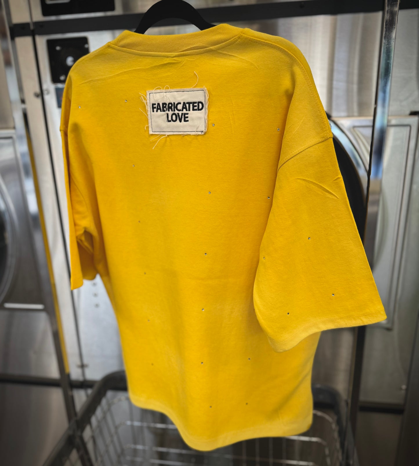 FABRICATED LOVE YELLOW “TRUST ISSUES” Drop shoulder cropped rhinestone Tee