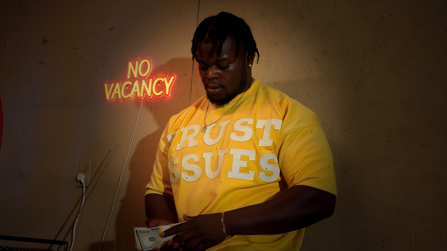 FABRICATED LOVE YELLOW “TRUST ISSUES” Drop shoulder cropped rhinestone Tee