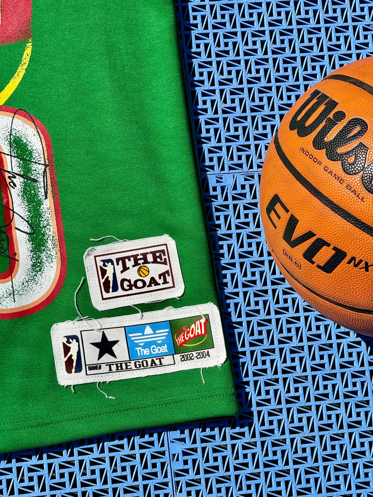 THE GOAT “KEMP” GRAPHIC PATCHED TEE.