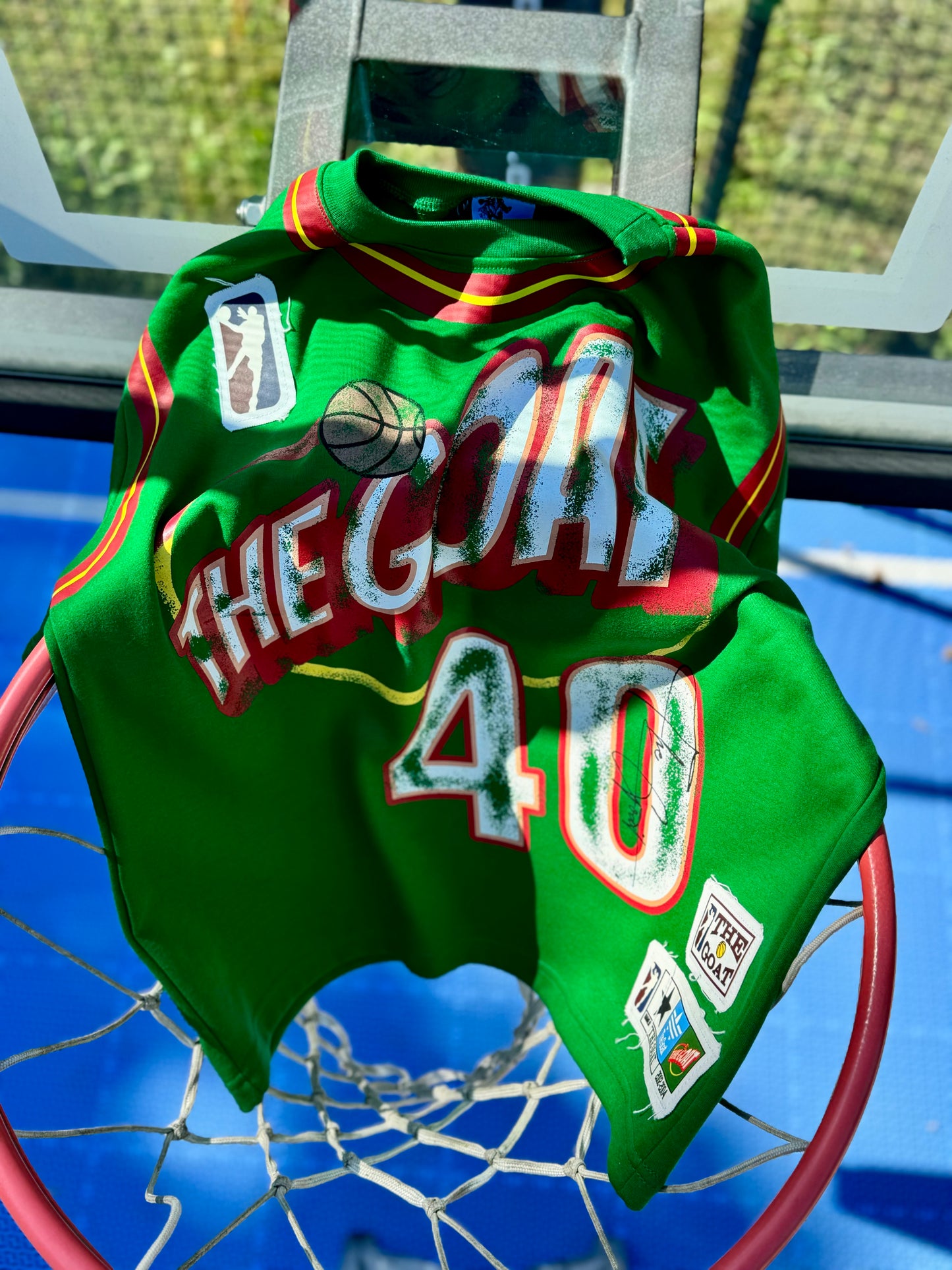 THE GOAT “KEMP” GRAPHIC PATCHED TEE.