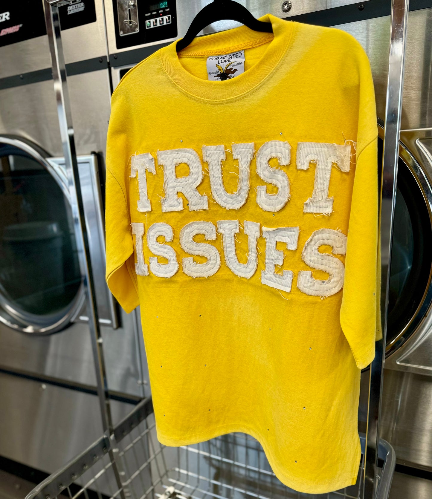 FABRICATED LOVE YELLOW “TRUST ISSUES” Drop shoulder cropped rhinestone Tee