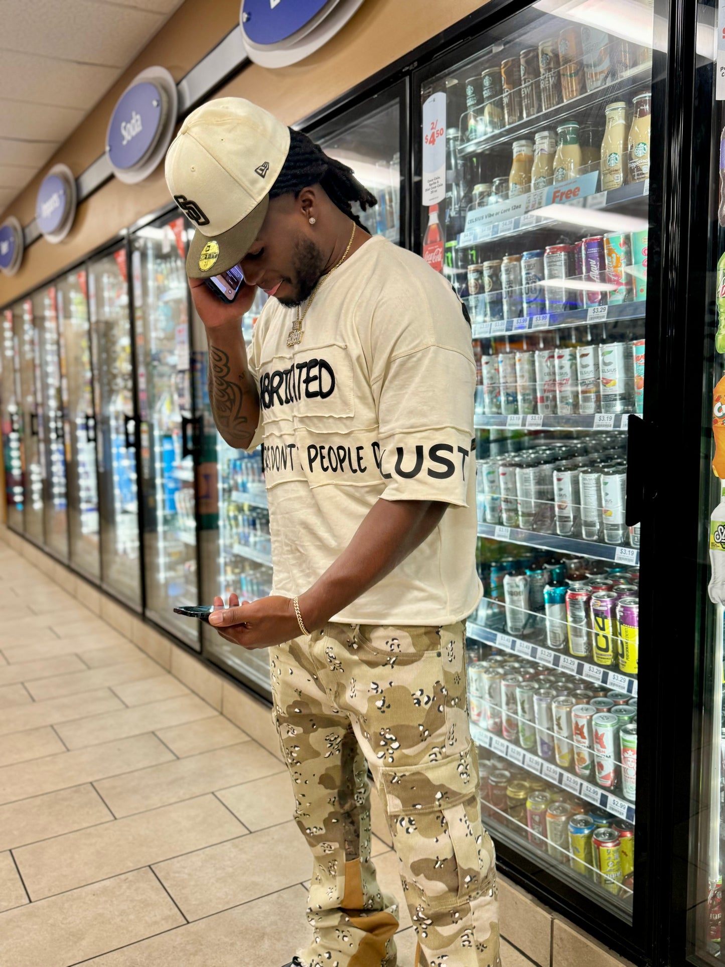 FABRICATED LOVE “NUMBERS DON’T LIE PEOPLE DO” DROP SHOULDER GRAPHIC TEE.