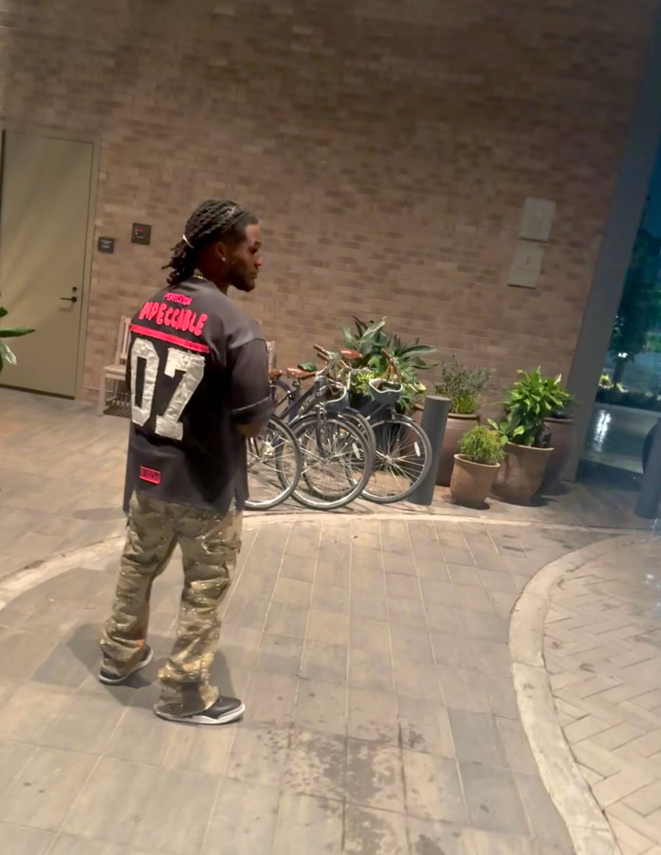 THE G.O.A.T BLACK/FUCHSIA “IMPECCABLE” EMBROIDERY PATCH DROP SHOULDER T-SHIRT