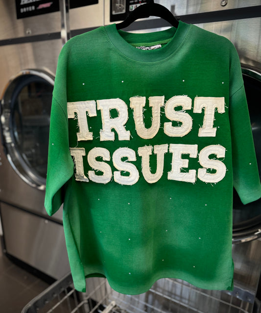 FABRICATED LOVE GREEN & WHITE
 “TRUST ISSUES” DROP SHOULD RHINESTONE TEE.