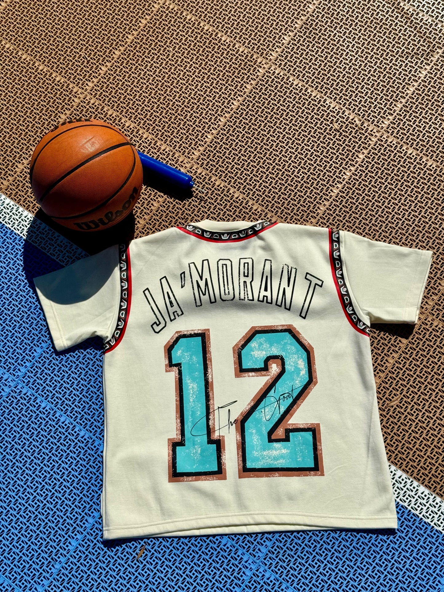 THE GOAT “JA’ MORANT” GRAPHIC PATCHED TEE.