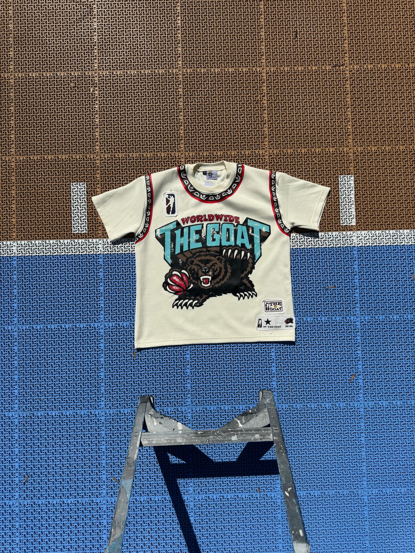 THE GOAT “JA’ MORANT” GRAPHIC PATCHED TEE.