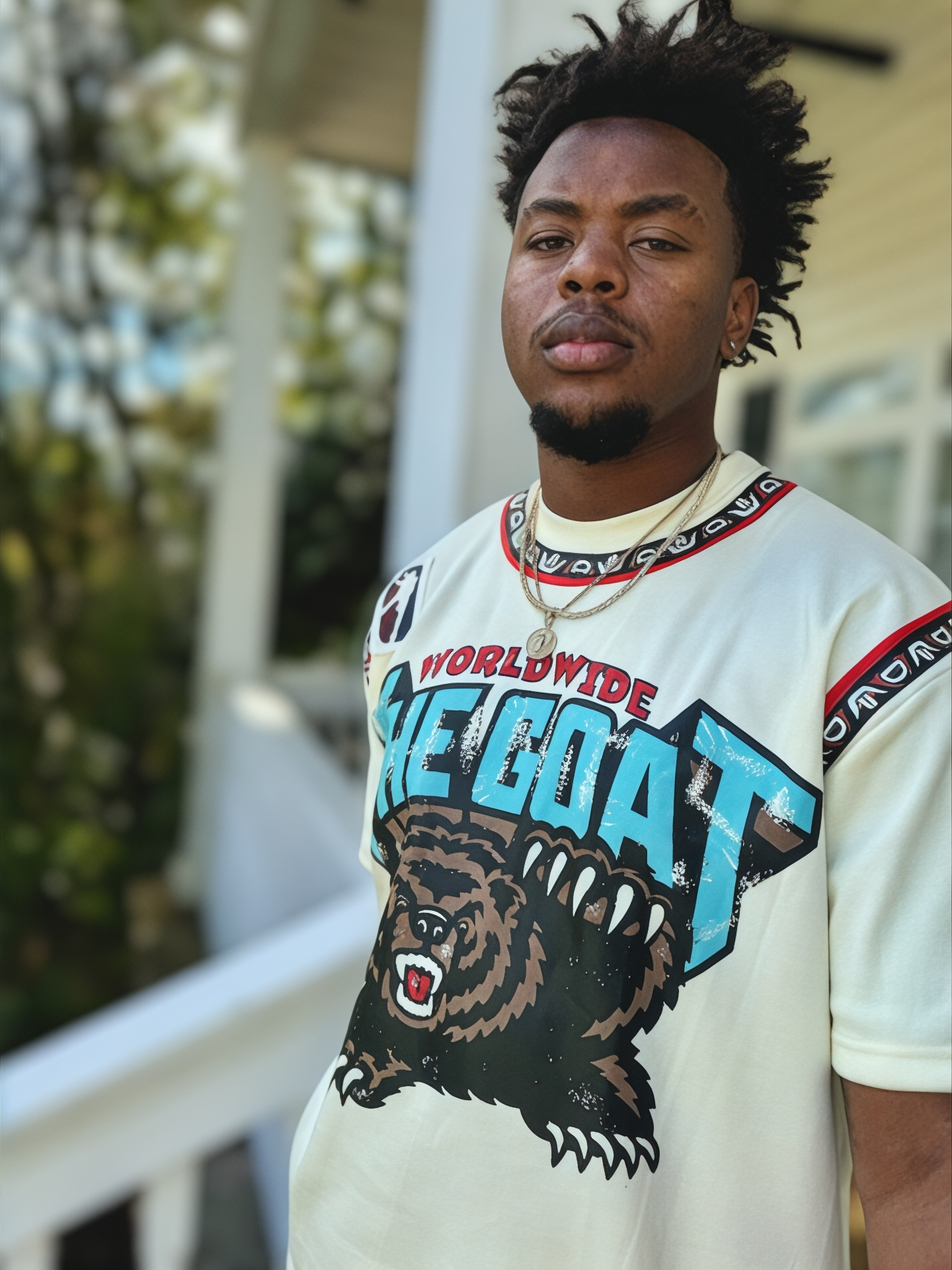 THE GOAT “JA’ MORANT” GRAPHIC PATCHED TEE.