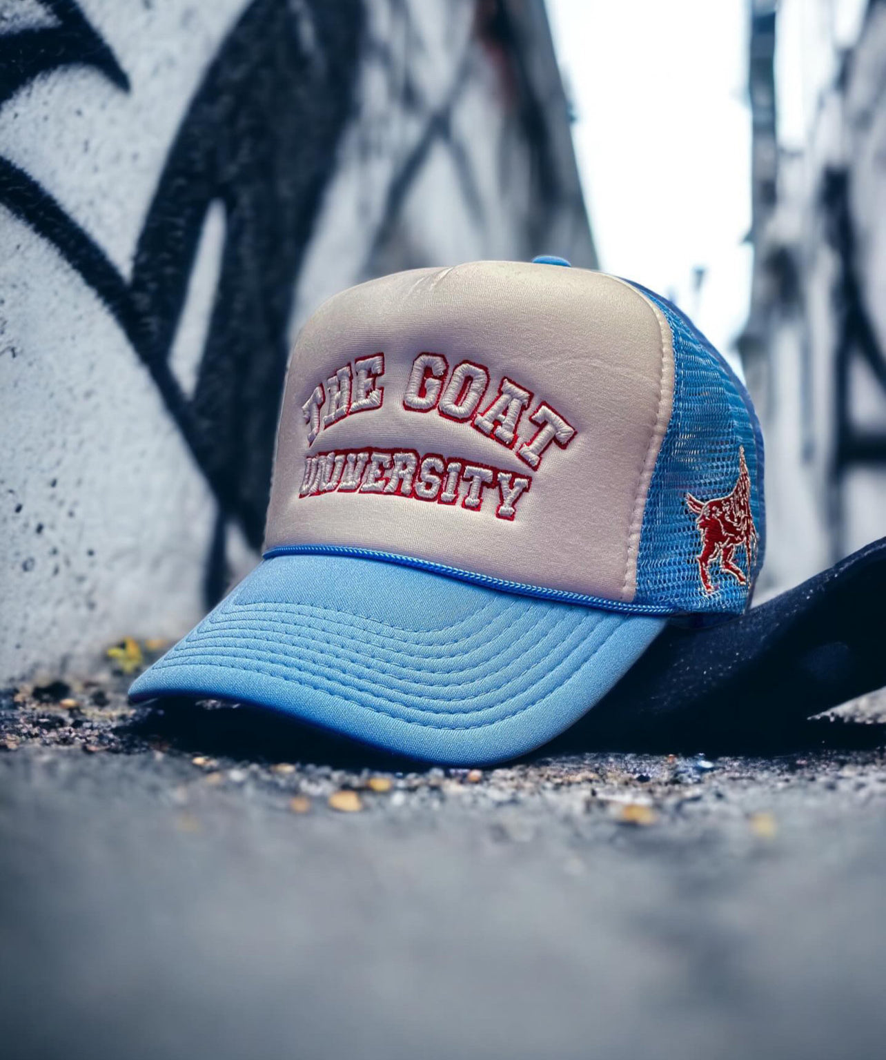“THE GOAT UNIVERSITY” BLUE/WHITE/RED 3D EMBROIDERY TRUCKER HAT