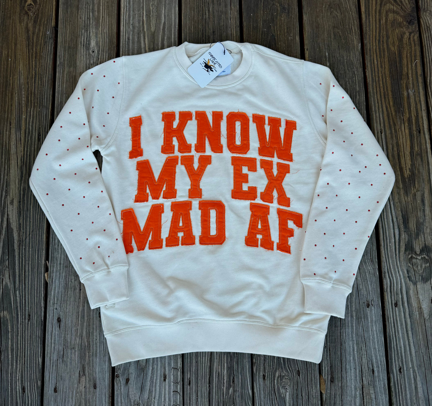 “I KNOW MY EX MAD AF” FABRICATED LOVE CREAM & ORANGE CREW NECK.