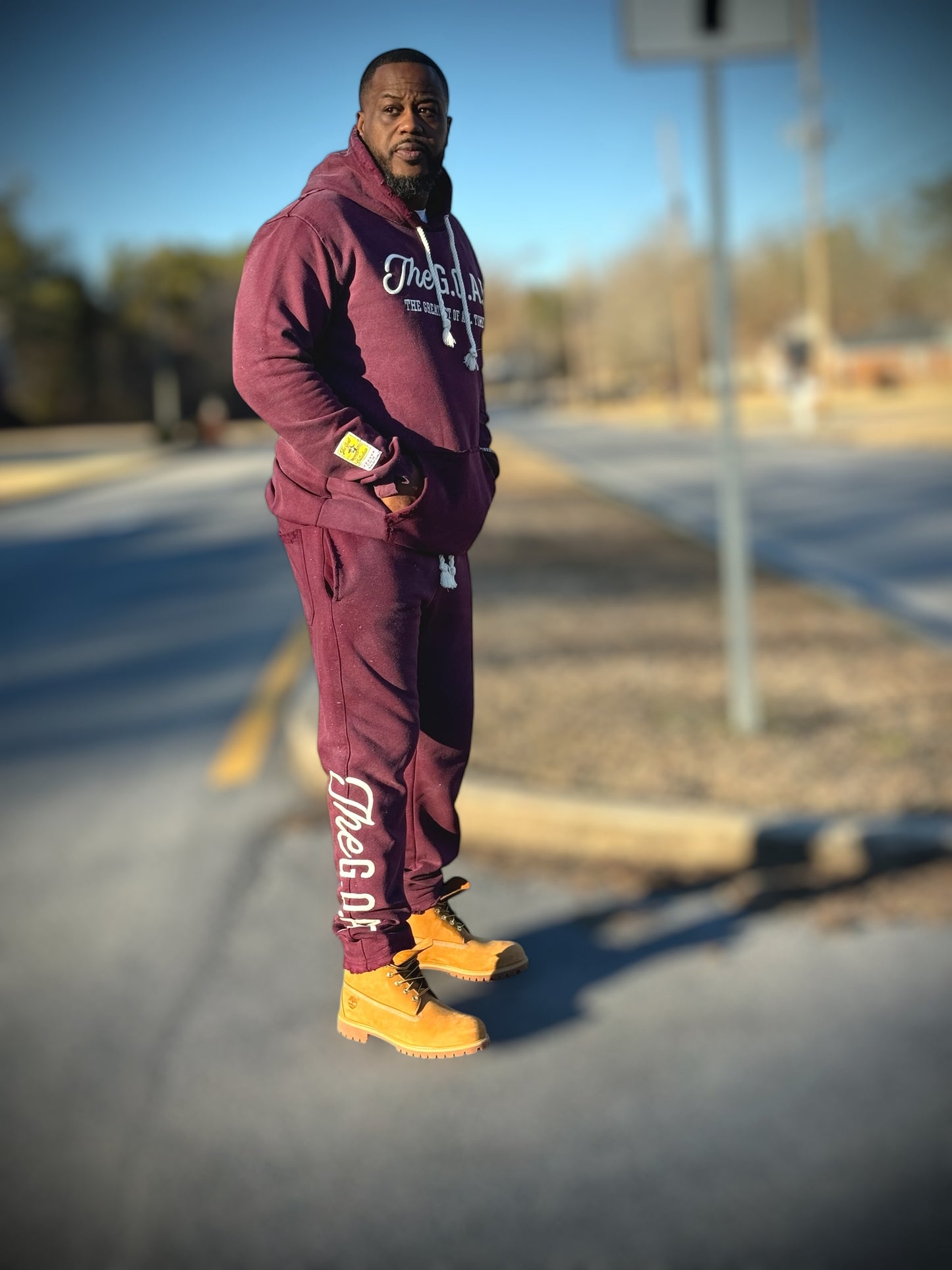 The G.O.A.T Signature Burgundy Hoodie jogger set.